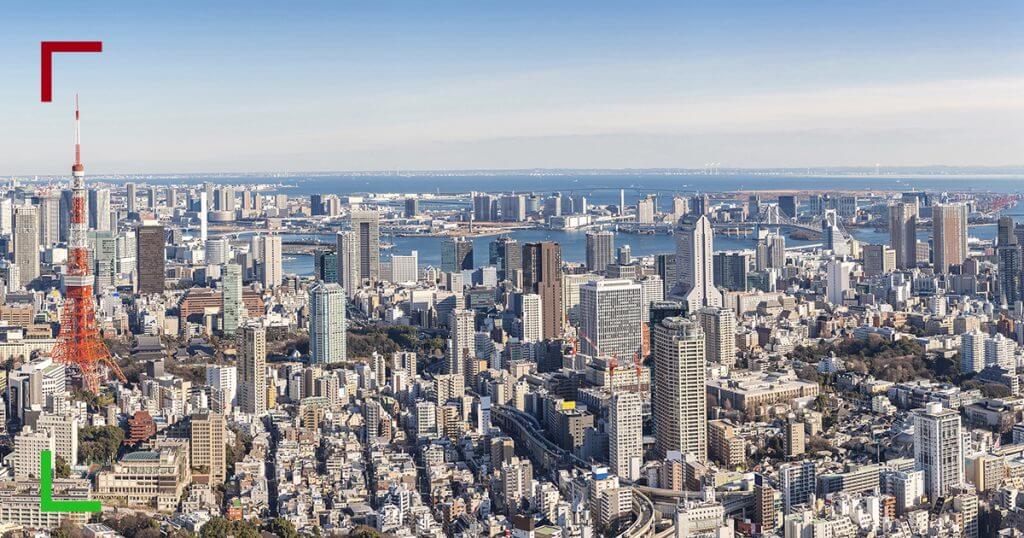 View of a large city with tall buildings. ECN Broker - 1:500 Leverage on Cryptos & Forex | OspreyFx 